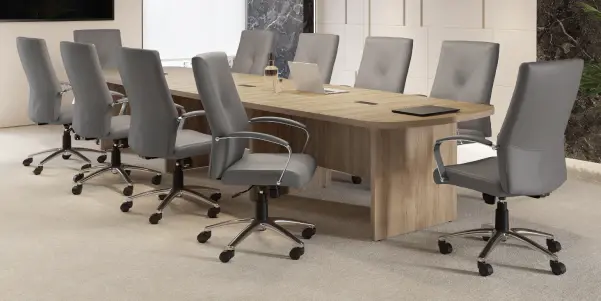 man and woman having a meeting while walking in the office