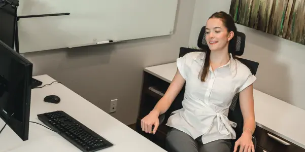 man and woman having a meeting while walking in the office