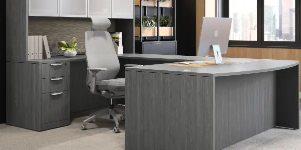 man and woman having a meeting while walking in the office